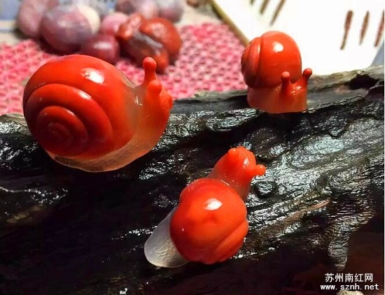 蜗牛题材南红玛瑙雕件的寓意